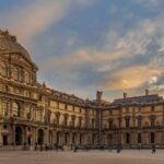 iew-of-famous-louvre-museum-with-louvre-pyramid-at-evening.jpg