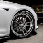 gunmetal wheels white car